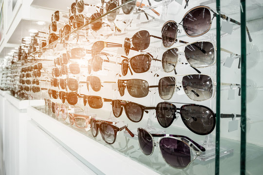 Sunglasses On Shelves In Glasses Store