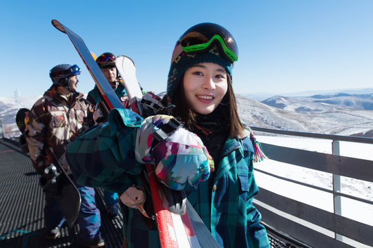 Young men and women outdoor skiing