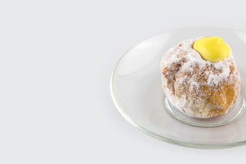 Closeup of Sweet Powdered sugar crusty donuts