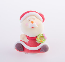 Santa Claus figurine on background