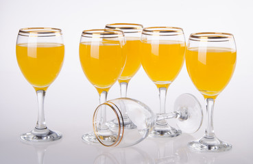 Full glass of orange juice on background