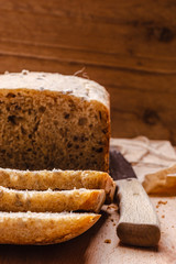 Sliced whole wheat bread on cutting board