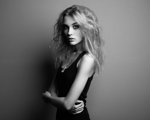 Portrait of young beautiful girl with blonde hair. Fashion photo. Hairstyle. Make up. Vogue Style....