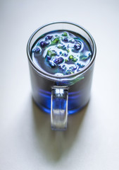 A cup of Butterfly blue pea tea.
