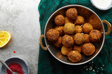 Overhead image of traditional jewish and middle eastern dish falafel. Israeli cuisine concept