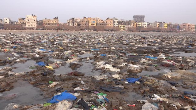 Disturbing quantity of plastic rubbish and other pollution at Versova Beach in Mumbai, India 