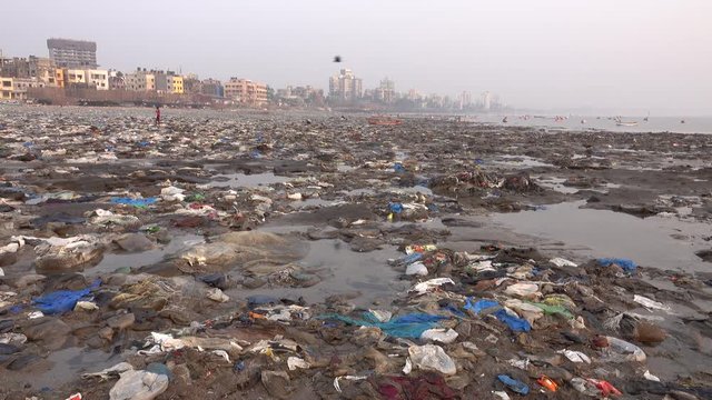 Disturbing quantity of plastic rubbish and other pollution at Versova Beach in Mumbai, India 