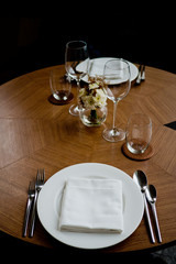 Empty glasses wine in restaurant. Glass water.dish spoon fork on table at restaurant