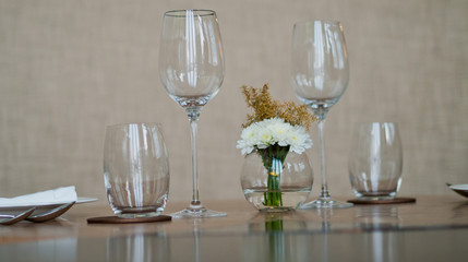 Empty glasses wine in restaurant. Glass water.dish spoon fork on table at restaurant
