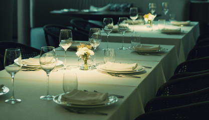 Empty glasses wine in restaurant. Glass water.dish spoon fork on table at restaurant