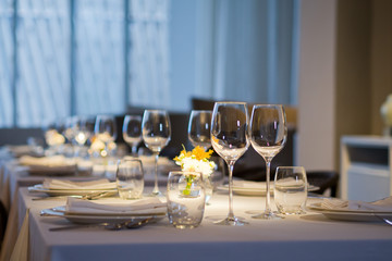 Empty glasses wine in restaurant. Glass water.dish spoon fork on table at restaurant