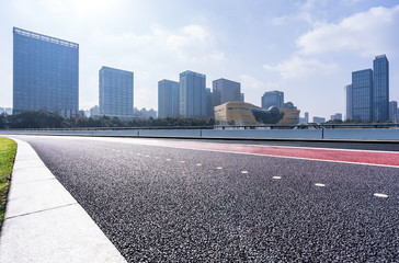 empty road with cityscape