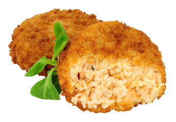 Breadcrumb covered salmon fish cakes isolated on a white background