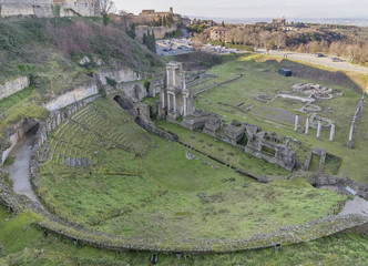 Fototapeta na wymiar Aerial view of the ruins of the Roman Theater and Baths in Volterra, Pisa, Tuscany, Italy
