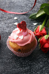 Delicious cupcake for Valentine Day. cake for Valentines day with chocolate and strawberries. Traditional homemade with red roses