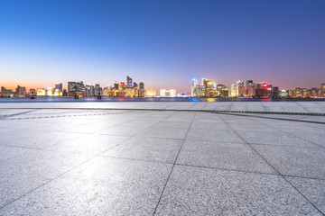 empty marble floor with cityscape