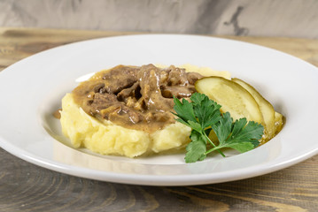 pork with mashed potato