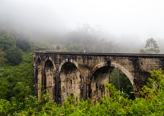 Fototapeta na wymiar bridge railways in the mountains, Ella, Sri Lanka mist morning