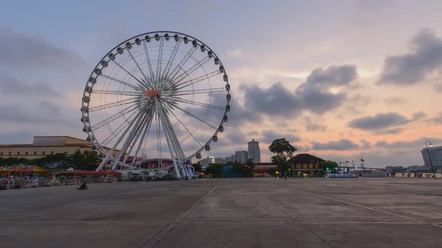 Day to night time lapse of Ferris wheel in carnival park