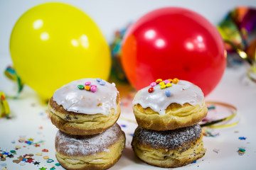 Balloons with streamers and donuts