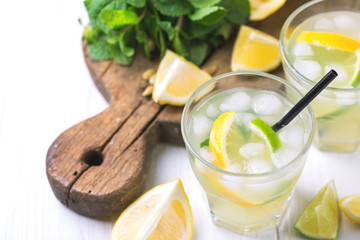 Italian lemon lime liqueur limoncello with ice and mint
