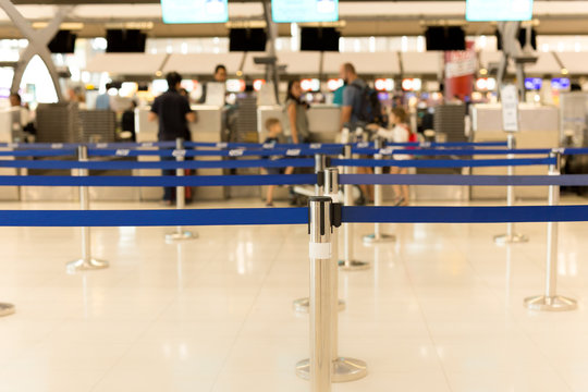 Passengers check-in line at the airport