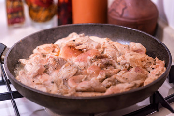 Close up chicken fillet on frying pan