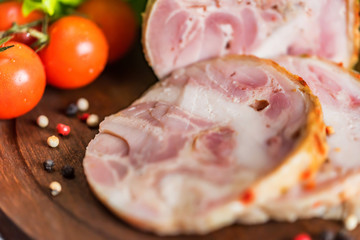 Sliced turkey roll, peppercorn and vegetables