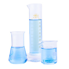 Chemical laboratory beakers and flasks with colorful liquids and reagents. Research science and medical laboratory.