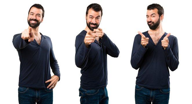 Set of Handsome man with beard pointing to the front