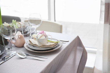 Beautiful Easter table setting with decorations