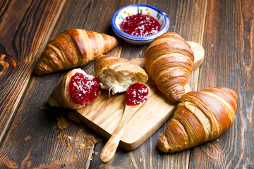 Fresh croissants on a wood