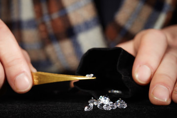 Old style diamond smuggler's hands with diamonds