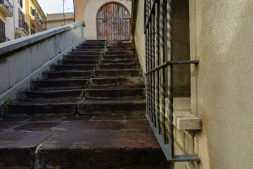Ancient stairs in Palma and old wood door