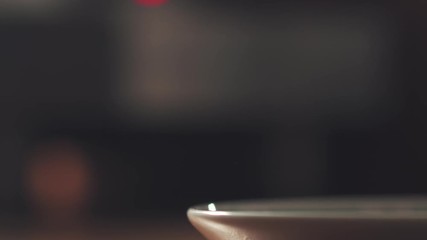 bring cup of coffee from coffee machine to the table