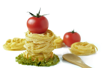 Pasta with tomatoes on a white background