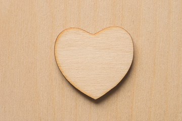 wooden heart macro on plywood