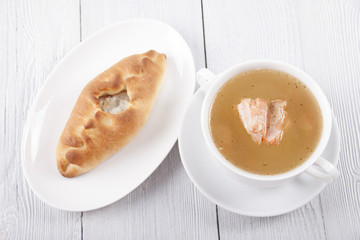 Rasstegai with fish and soup from a salmon