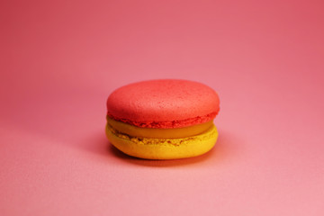 Bright food photography of macroons on pink background