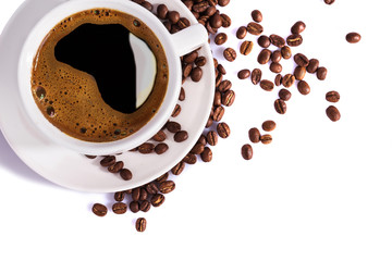 Cup of coffee with foam and roasted beans