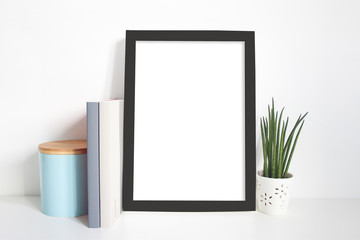 A4 portrait black frame on desk