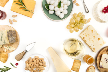 Selection of cheeses on white with copy space