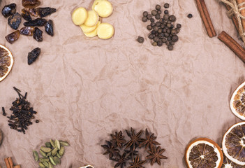 Cloves, ginger slices, cinnamon, star anise, brown sugar, cardamom