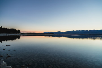 Sunset colors and reflection at Mount Cook the Aoraki/Mount Cook National Park, South island, New...