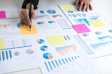 Business Financing Accounting Banking Concept, business woman doing finances and calculate about cost to real estate investment and in other, tax system