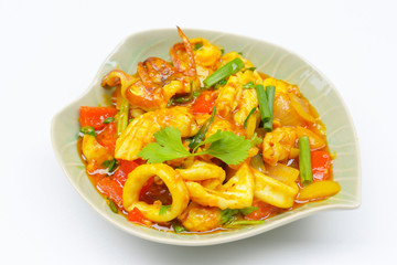 Stir fried fresh squid with yoke eggs ,onion and chili.
