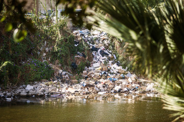 River filled with trash and plastic