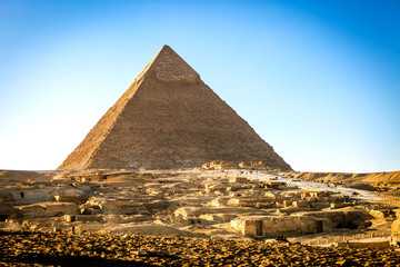 Fototapeta na wymiar Biggest Pyramid of Cairo at sunset with noone