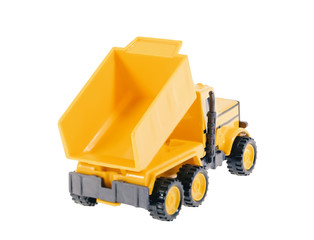 Dumper / Plastic toy dumper on white background.