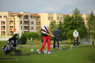 Golf players on field 